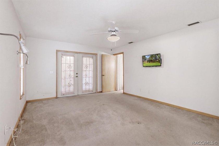 Nestled beneath a canopy of majestic oak trees and overlooking - photo 20