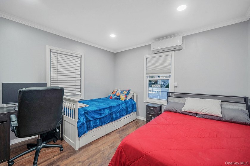 Welcome to this charming 4-bedroom, 2-bath Cape Cod situated on - photo 21