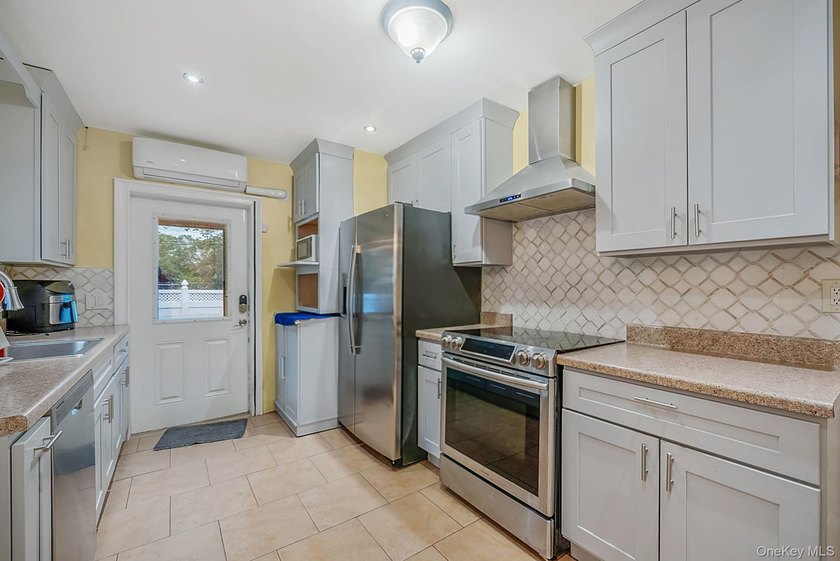 Welcome to this charming 4-bedroom, 2-bath Cape Cod situated on - photo 29