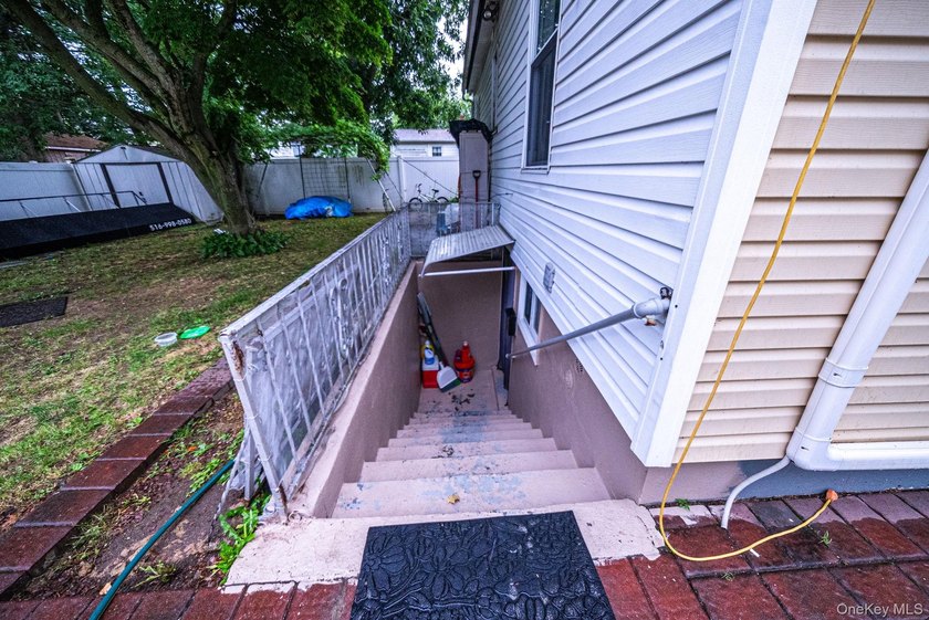Welcome to this charming 4-bedroom, 2-bath Cape Cod situated on - photo 32