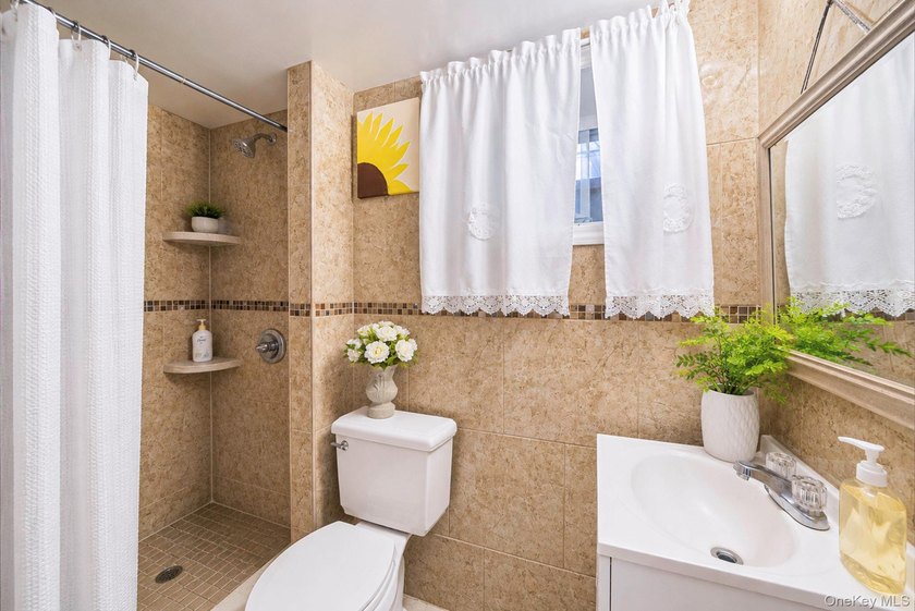 Welcome to this charming 4-bedroom, 2-bath Cape Cod situated on - photo 33