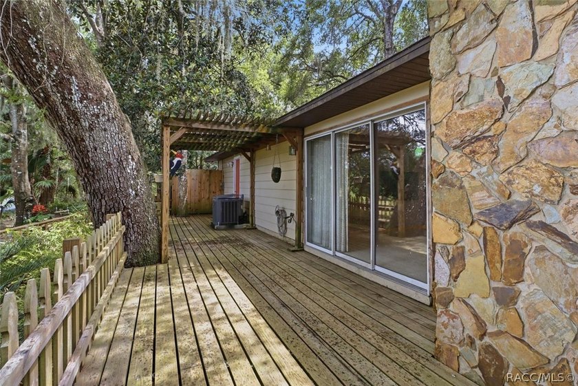 Nestled beneath a canopy of majestic oak trees and overlooking - photo 33