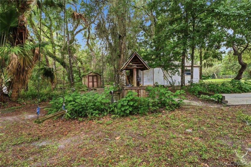 Nestled beneath a canopy of majestic oak trees and overlooking - photo 41