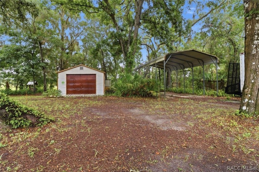 Nestled beneath a canopy of majestic oak trees and overlooking - photo 43