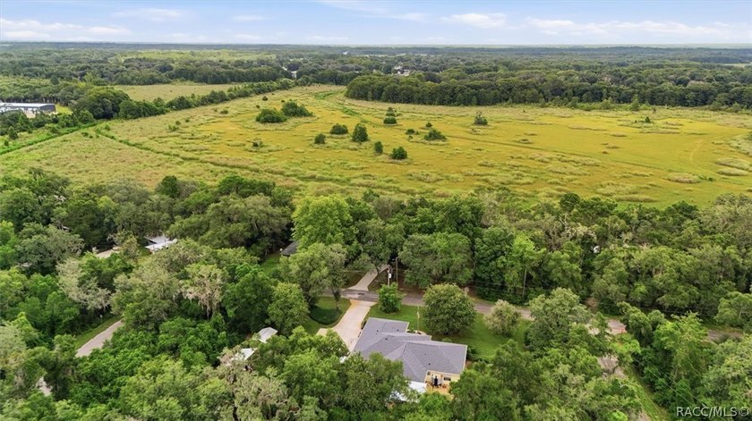 Nestled beneath a canopy of majestic oak trees and overlooking - photo 48