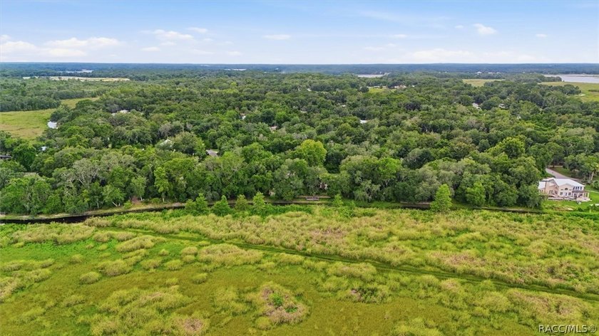 Nestled beneath a canopy of majestic oak trees and overlooking - photo 50