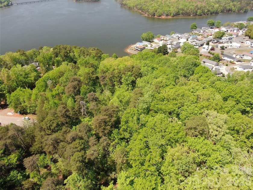 Welcome to Heron Bay, an exclusive gated community nestled on - photo 3