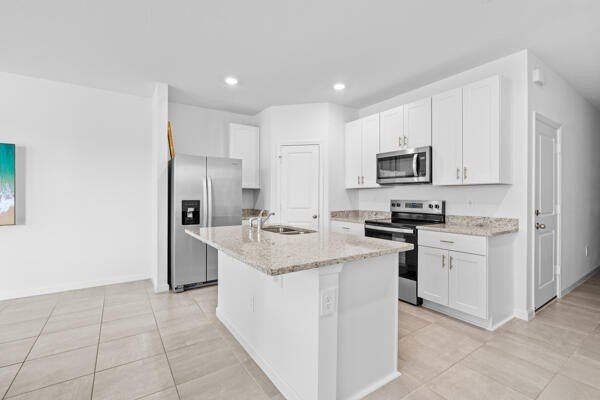 Step inside the versatile Pompano layout, where an open concept - photo 9