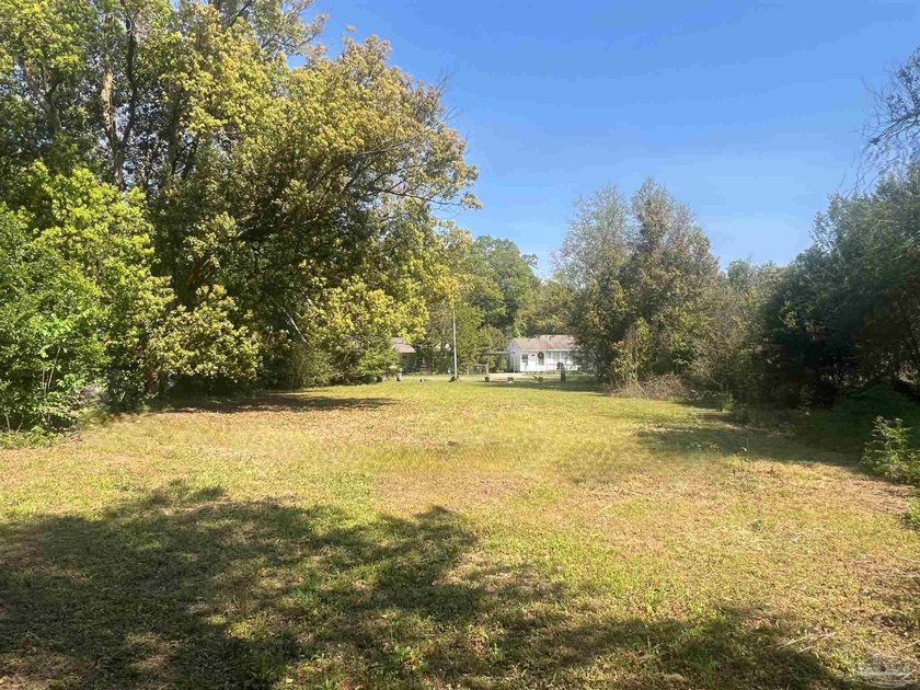 Cleared and level one-third acre lot ready for your new home in - photo 8
