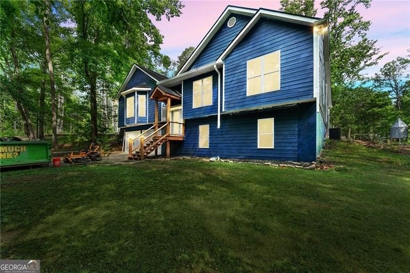 RARE OPPORTUNITY! Set on 4.4 private acres in one of Forsyth - photo 3
