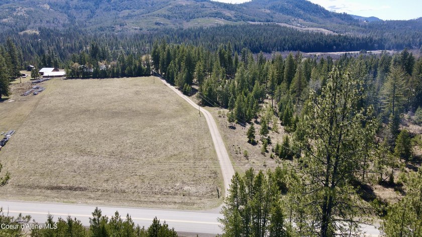 This expansive 120-acre ranch offers sweeping mountain and - photo 6