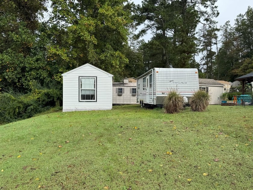 Lot with septic, camper, and room with a peek a boo view of the - photo 8