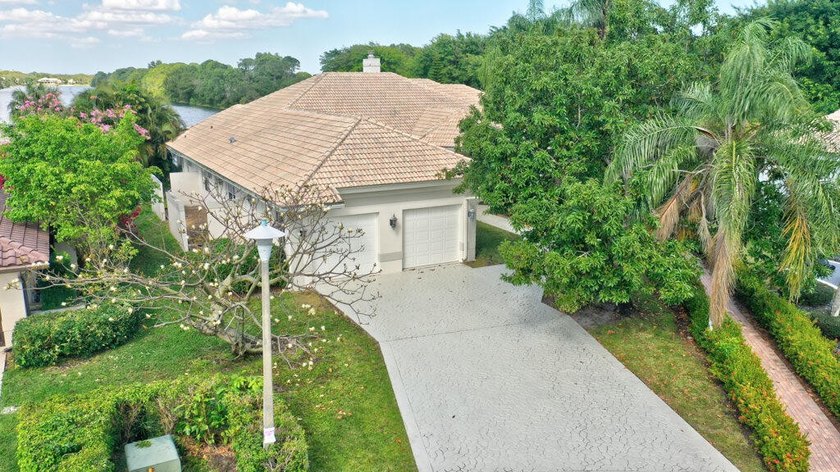 This beautiful home is in the picturesque, gated community of - photo 2