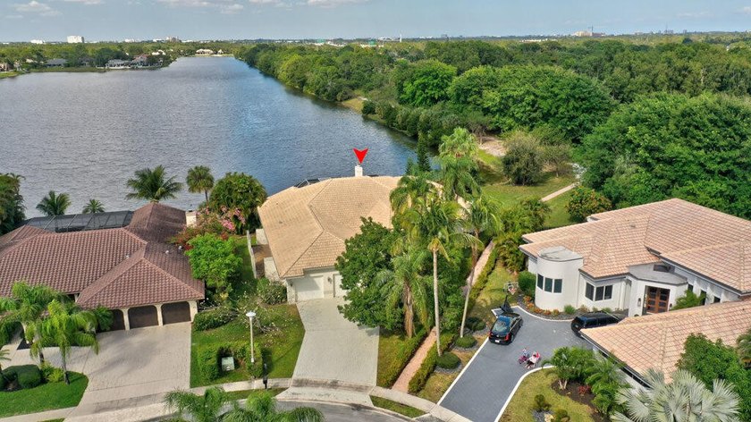 This beautiful home is in the picturesque, gated community of - photo 3