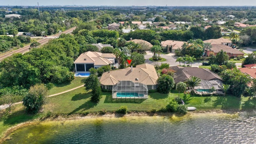 This beautiful home is in the picturesque, gated community of - photo 7