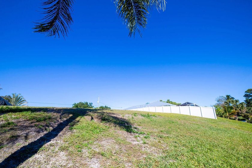 Own Your Slice of Paradise! Ocean Access Lot in Port St. Lucie! - photo 11
