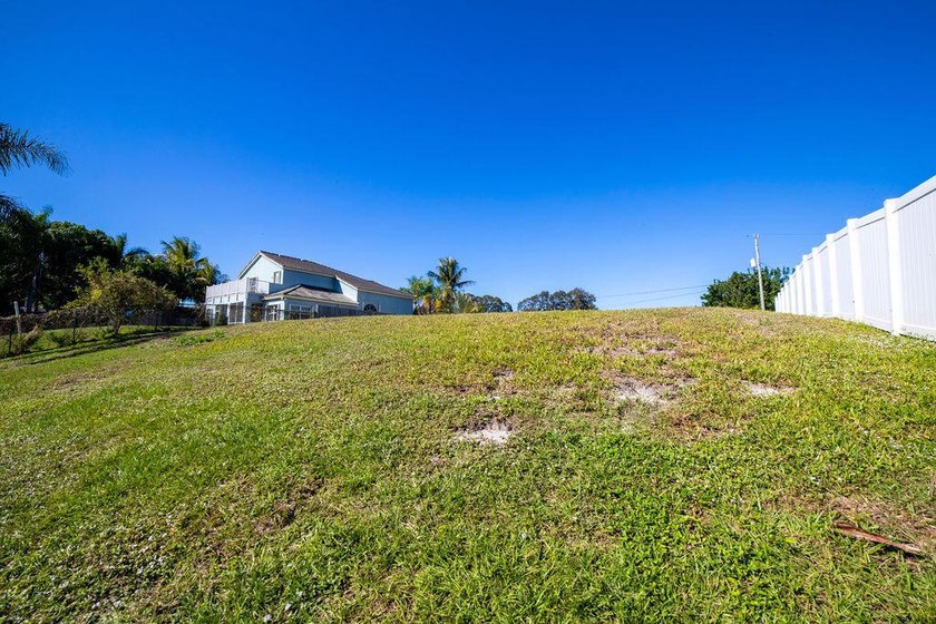 Own Your Slice of Paradise! Ocean Access Lot in Port St. Lucie! - photo 12