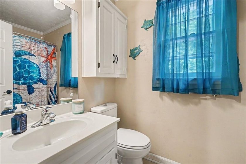 Welcome to this charming traditional home nestled on a spacious - photo 13