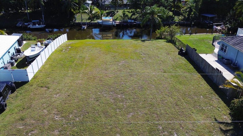 Own Your Slice of Paradise! Ocean Access Lot in Port St. Lucie! - photo 32