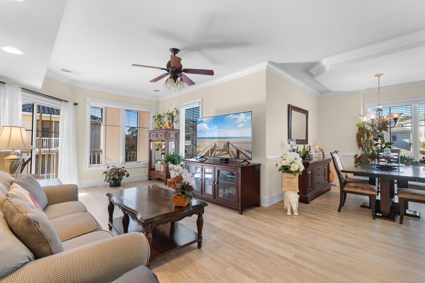 Sunlight pours into this bright, open 3-bedroom, 2-bath end-unit - photo 11