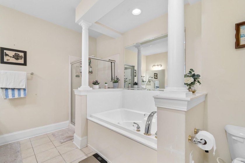Sunlight pours into this bright, open 3-bedroom, 2-bath end-unit - photo 17