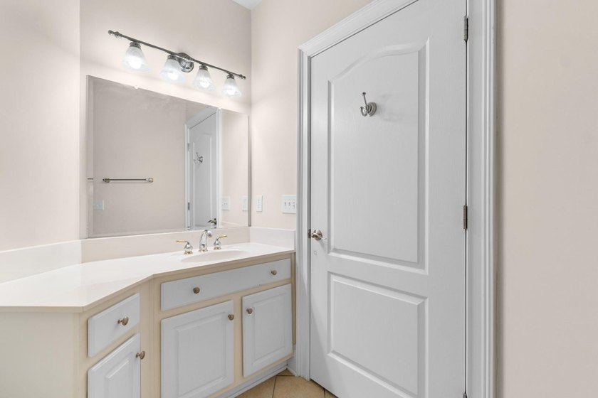 Sunlight pours into this bright, open 3-bedroom, 2-bath end-unit - photo 21