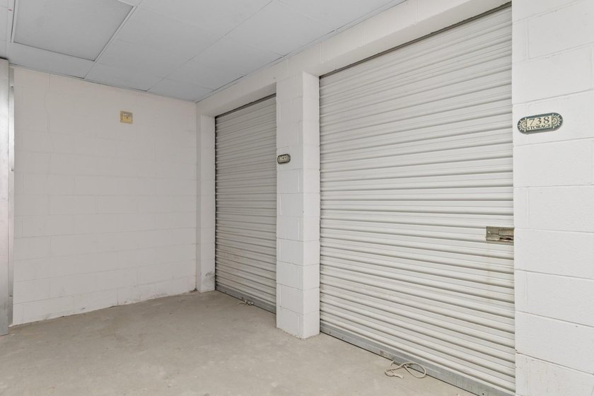 Sunlight pours into this bright, open 3-bedroom, 2-bath end-unit - photo 27