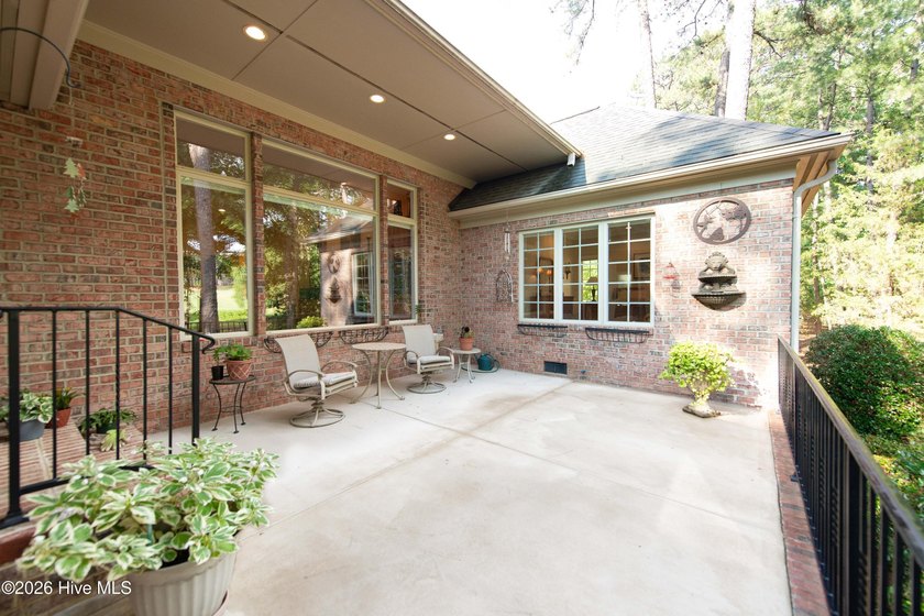 Privately nestled within the Gates of Pinewild Country Club of - photo 32
