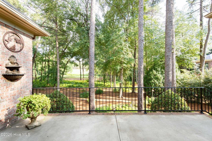 Privately nestled within the Gates of Pinewild Country Club of - photo 34
