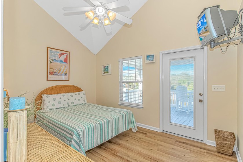 This LAKE FRONT 5 bedroom 3.5 bath raised beach house with - photo 20