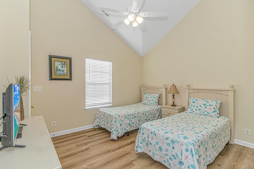 This LAKE FRONT 5 bedroom 3.5 bath raised beach house with - photo 24