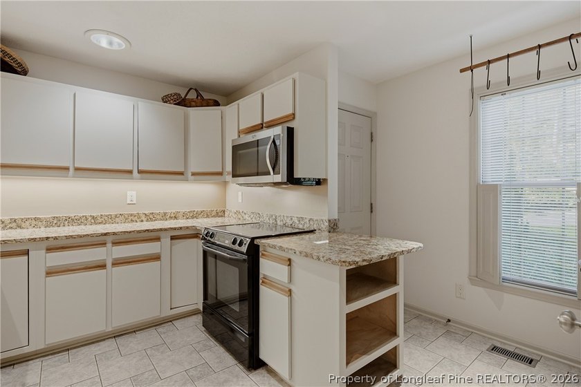 ONE OF A KIND! Nestled on nearly two acres in the heart of - photo 10