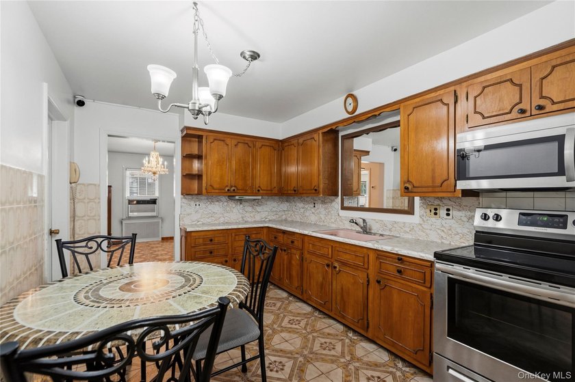 Welcome to this beautifully maintained expanded Cape where - photo 11