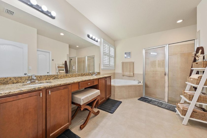 Nestled within the prestigious gated community of Rialto, this - photo 16