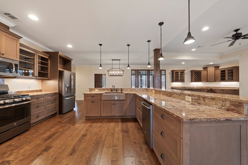WELCOME HOME TO THIS STUNNING CUSTOM-BUILT ONE-STORY LOCATED ON - photo 21