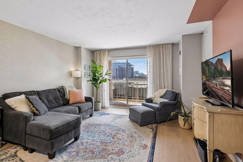 Enjoy sunny South-facing skyline views from this beautifully - photo 3