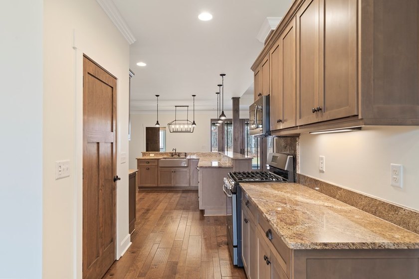 WELCOME HOME TO THIS STUNNING CUSTOM-BUILT ONE-STORY LOCATED ON - photo 26