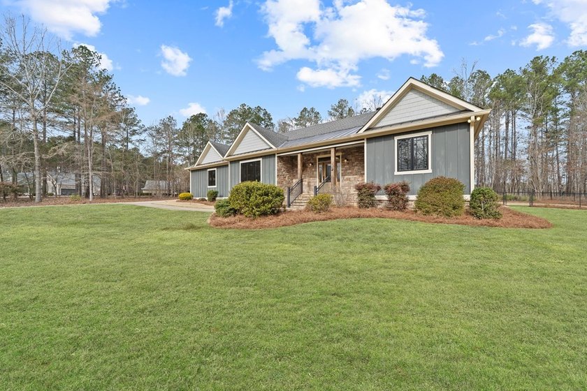 WELCOME HOME TO THIS STUNNING CUSTOM-BUILT ONE-STORY LOCATED ON - photo 46