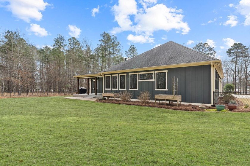 WELCOME HOME TO THIS STUNNING CUSTOM-BUILT ONE-STORY LOCATED ON - photo 49