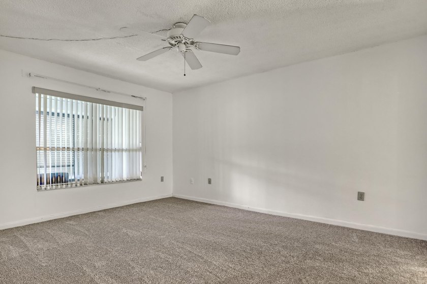 Step into this inviting two-bedroom, two-bathroom condo, where - photo 20