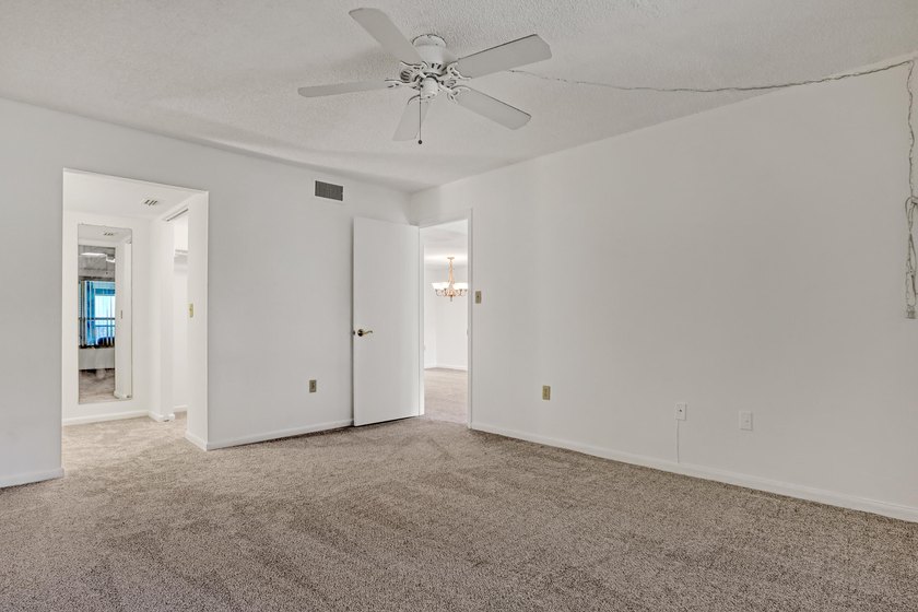 Step into this inviting two-bedroom, two-bathroom condo, where - photo 21