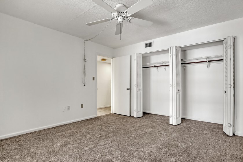 Step into this inviting two-bedroom, two-bathroom condo, where - photo 25