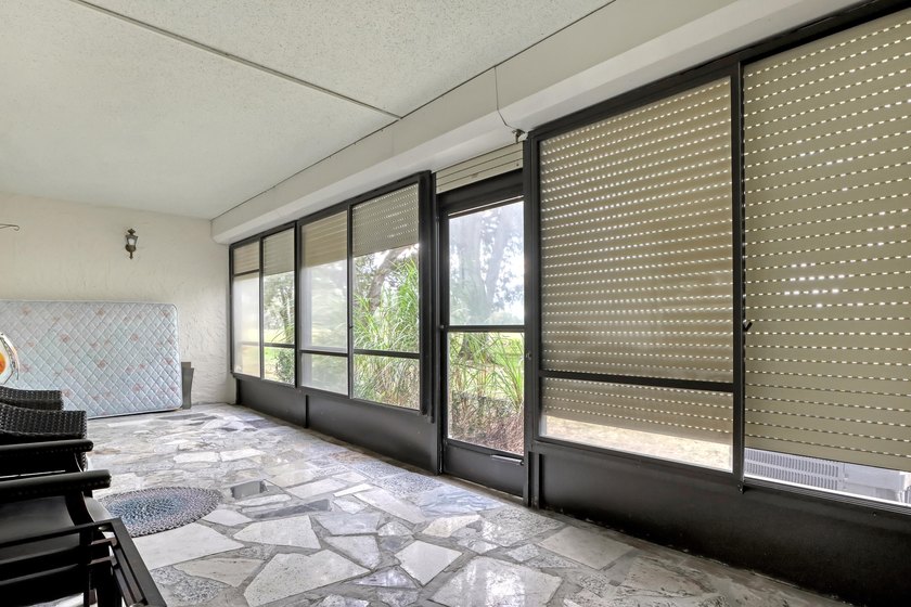Step into this inviting two-bedroom, two-bathroom condo, where - photo 29