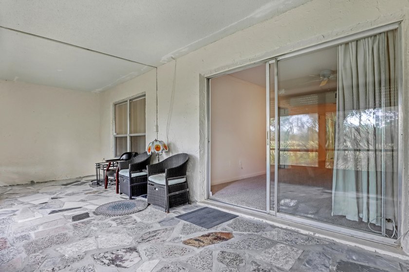 Step into this inviting two-bedroom, two-bathroom condo, where - photo 30