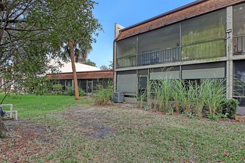 Step into this inviting two-bedroom, two-bathroom condo, where - photo 31