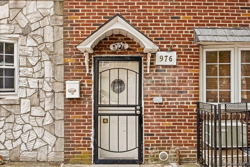 Welcome to this solid brick two-family home in the popular - photo 3