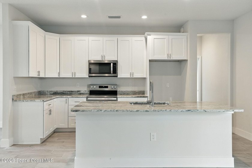 10K CLOSING COST CREDIT!! Welcome to your dream home! This - photo 7