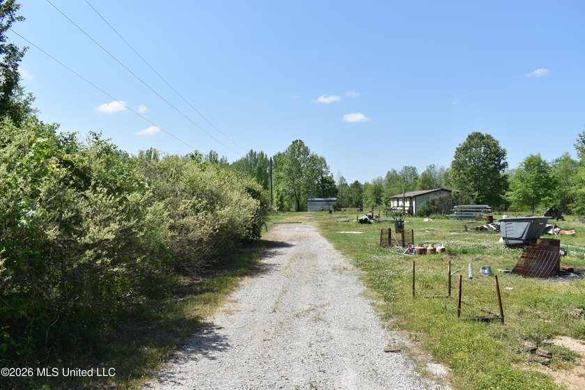 48 acres with a 3 BR 2 BA mobile home, shop, and additional home - photo 31