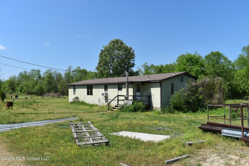48 acres with a 3 BR 2 BA mobile home, shop, and additional home - photo 32