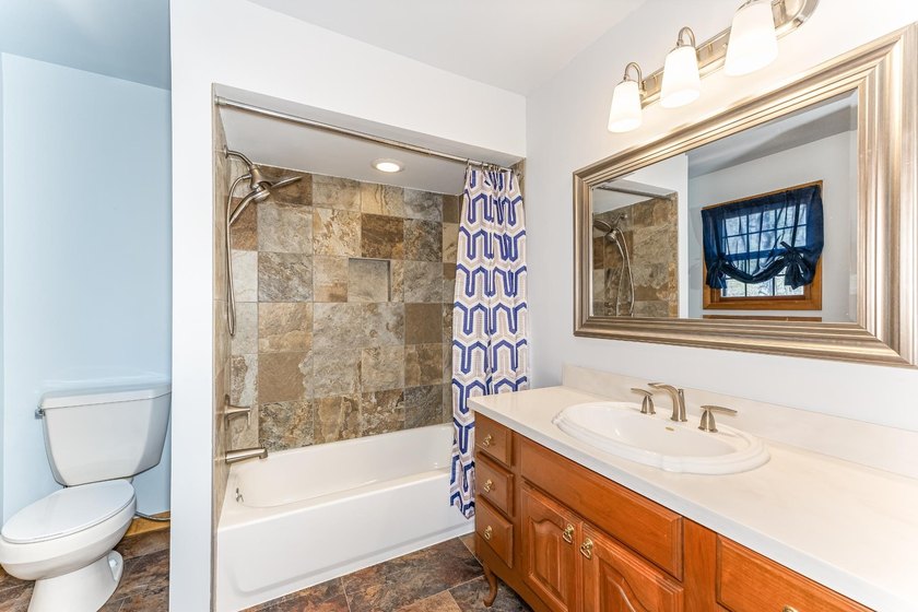 Exquisitely renovated, south-facing chalet-style lakefront - photo 23